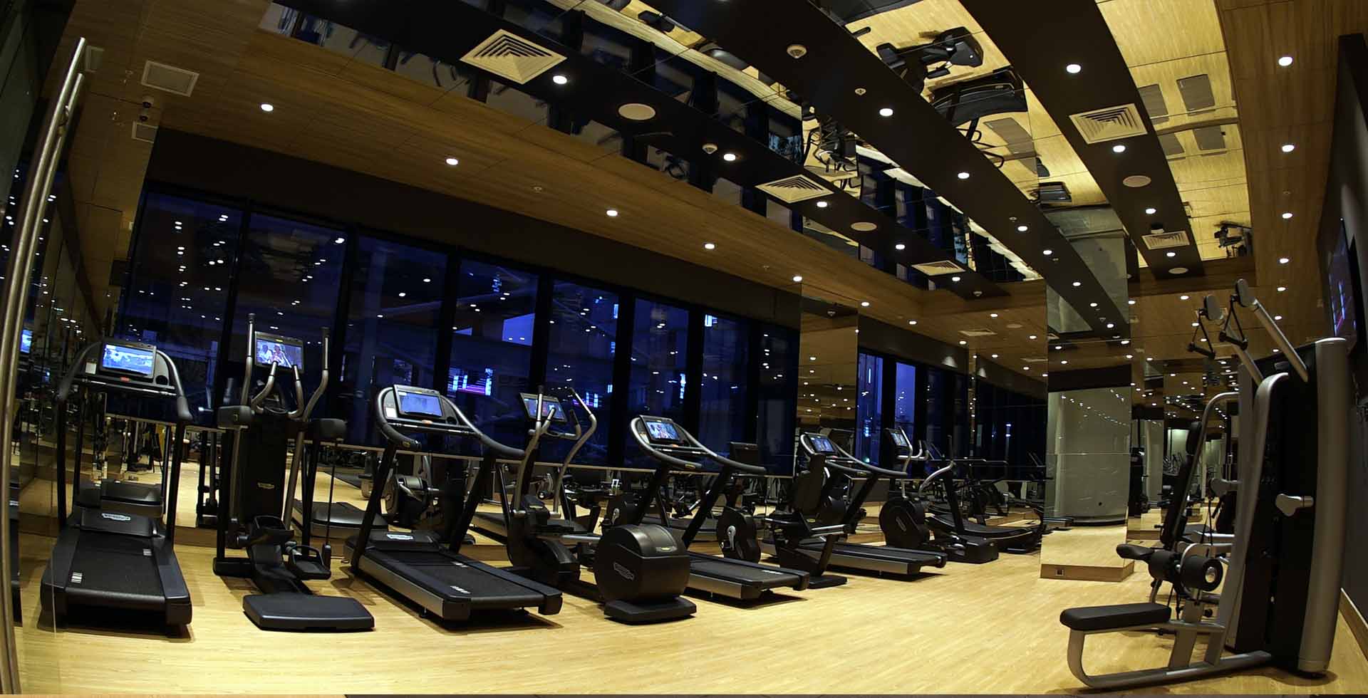 Sauna Dekor's contemporary fitness center in Eindhoven, equipped with modern exercise facilities, combines fitness excellence with sleek design for an elevated workout environment.